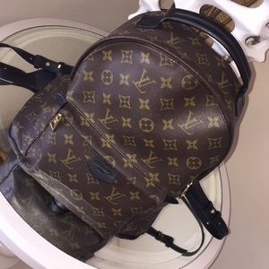 Brown & Black leather backpack 🤗